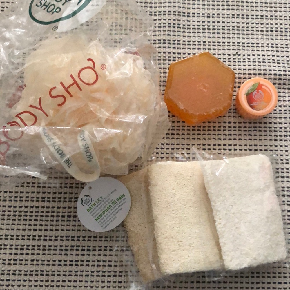 Bath Lily wash cloth, lip balm and soap The Body Shop and 3 pumicers